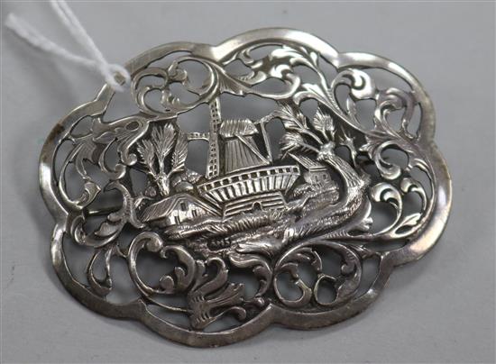 A 19th century Dutch white metal pierced and embossed brooch, 60mm.